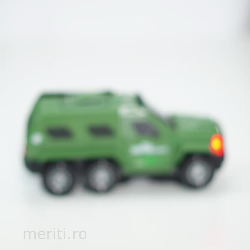 Masinuta militara cu sistem de tragere, rotatie 360 grade + 7 discuri fosforescente